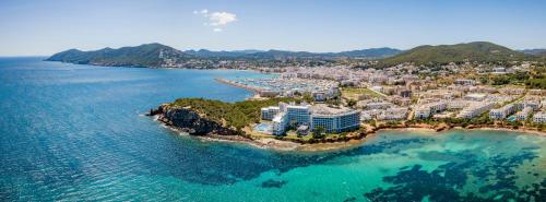 an aerial view of a resort on an island in the ocean at Melia Ibiza - Adults Only in Santa Eularia des Riu