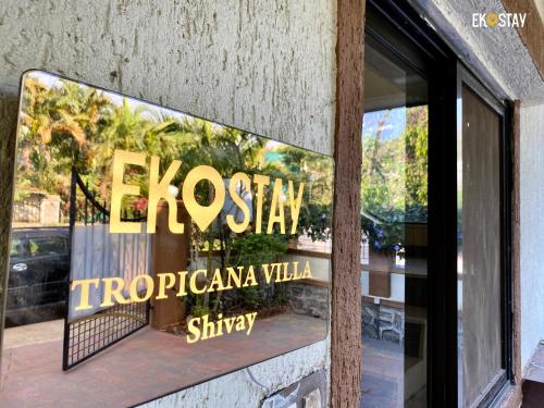 Una televisión o centro de entretenimiento en EKOSTAY - Tropicana Villa