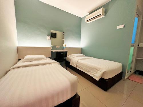 Katil atau katil-katil dalam bilik di De UPTOWN Hotel @ SS2