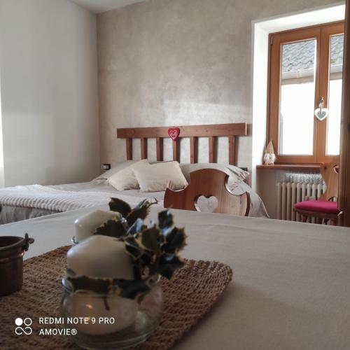 Ένα ή περισσότερα κρεβάτια σε δωμάτιο στο Casa Gaudia