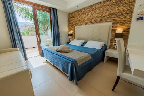 Postel nebo postele na pokoji v ubytování Prince Franklyn Hotel