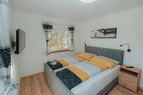Katil atau katil-katil dalam bilik di Bergblickapartments