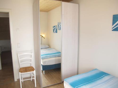 Ένα ή περισσότερα κρεβάτια σε δωμάτιο στο Holiday Home Sanddorn by Interhome