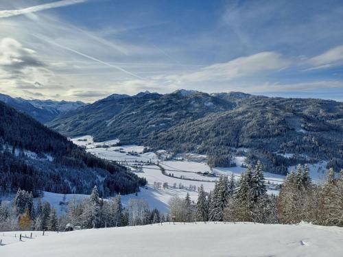 a view of a snow covered mountain with a valley at Apartment Tobias 1 by Interhome in Radstadt