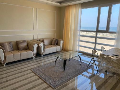 Zona de estar de Al seeb beach appartements
