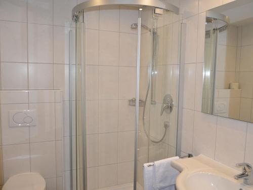 a bathroom with a shower and a sink at Apartment Georg by Interhome in Kappl