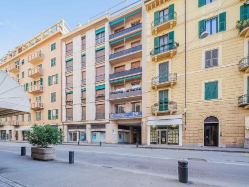 an empty street in front of a large building at Studio Rosso by Interhome in Rapallo