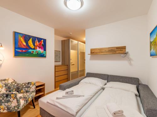 Postel nebo postele na pokoji v ubytování Apartment Adlerblick alpe maritima Ski & See - 22 by Interhome
