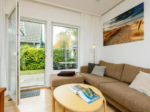 Posezení v ubytování Apartment Am Küstenwald by Interhome