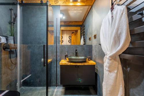 a bathroom with a sink and a shower at Centrum Park 2 Apartament 2 in Szklarska Poręba