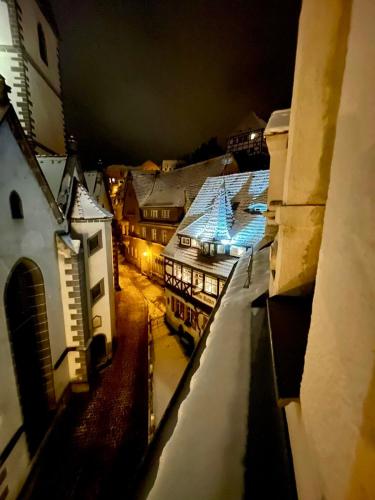 an aerial view of a city at night at Pension am Markt Meißen in Meißen