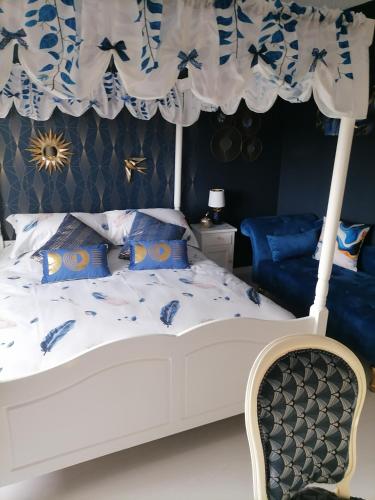 Postel nebo postele na pokoji v ubytování Chez Alain et Fabiola