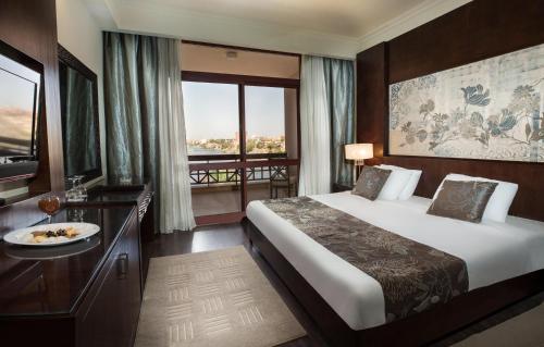 Katil atau katil-katil dalam bilik di Pyramisa Island Hotel Aswan