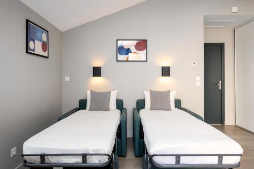 Кровать или кровати в номере Staycity Aparthotels Marseille Centre Vieux Port