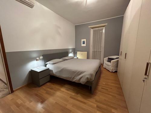 Кровать или кровати в номере Appartamento CoVa