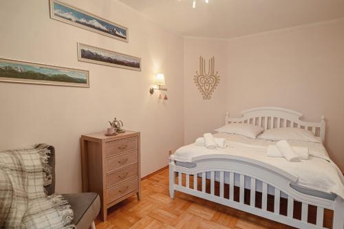 Posteľ alebo postele v izbe v ubytovaní Apartament Karpielówka View Od-nowa
