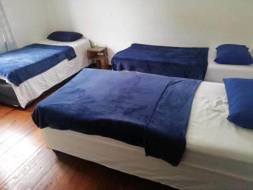 Säng eller sängar i ett rum på PHAKADEHOMES