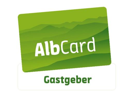 a green logo for an alber adelaideer at Ferienwohnung Rabus in Bisingen