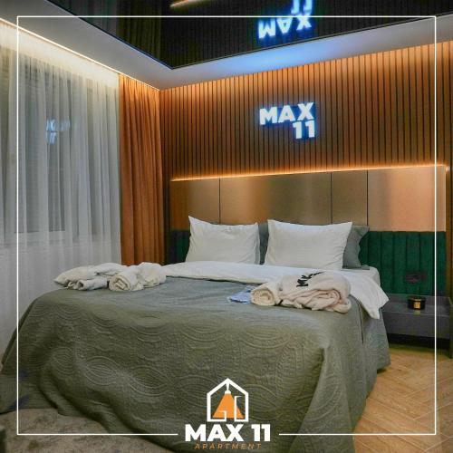 Postel nebo postele na pokoji v ubytování MAX 11 Apartman