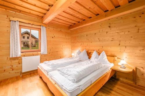 Postel nebo postele na pokoji v ubytování Chalet Dachsteinblick