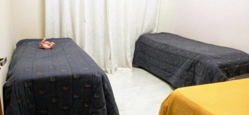 Postel nebo postele na pokoji v ubytování Casa Sana