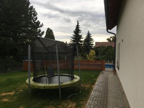 a playground in the yard of a house at U Čmeláka in Vyskeř