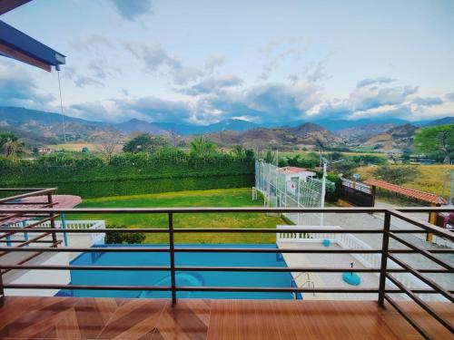a balcony with a view of the mountains at Quinta Esperanza - Habitación Matrimonial in Loja