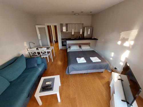 Postel nebo postele na pokoji v ubytování Apartment Premier 1 A Blok