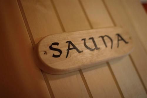 a sign that says sauna on a door at Ecolodge 1 in Medebach