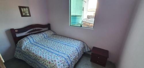 Tempat tidur dalam kamar di Jcapartamentos