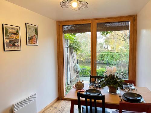 Photo de la galerie de l'établissement Au fil de l'eau - Rivière - Garage pour motos - 4 pers, au Mans