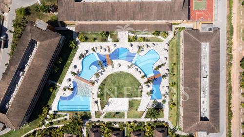 an overhead view of a pool at a resort at Eco Resort - Praia dos Carneiros - Ao lado da Igrejinha in Praia dos Carneiros