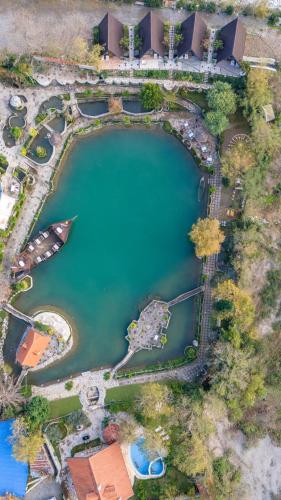 an aerial view of a lake with a resort at Kompleksi Turistik DEA in Shkodër