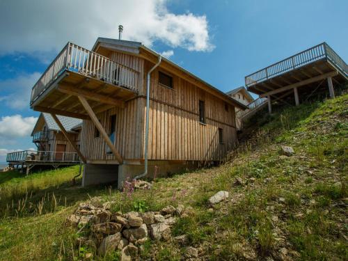 a building on the side of a hill at Chalet Klippitztörl 341 by Interhome in Klippitztorl