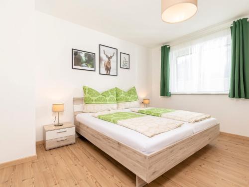 Ένα ή περισσότερα κρεβάτια σε δωμάτιο στο Apartment Apart Schachinger by Interhome