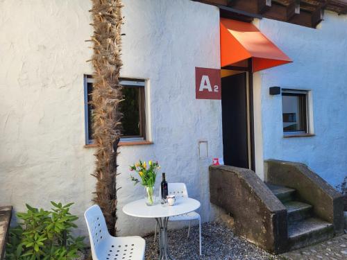 Posezení v ubytování Apartment Villaggio Sureggio A2 mit TicinoTicket by Interhome