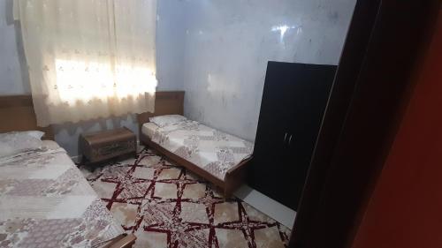 Ліжко або ліжка в номері Appartement Stade Tanger