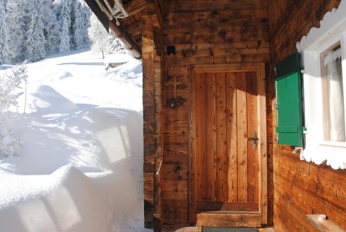 Alpenchalet Piz Hüsli v zimě