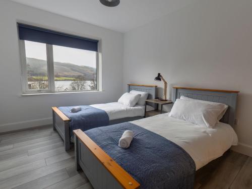 Un ou plusieurs lits dans un hébergement de l'établissement Holiday Home Loch View by Interhome