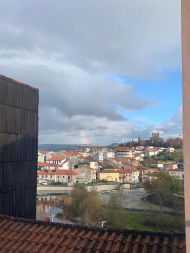 a view of a city from a building at Pôr do Sol in Bragança