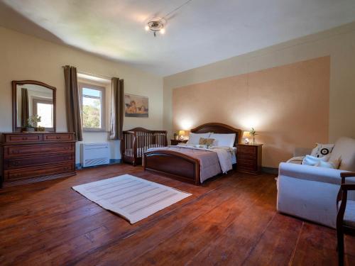 Кровать или кровати в номере Holiday Home Stazzu lu Bulioni by Interhome