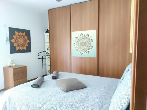 Letto o letti in una camera di Casa Akira