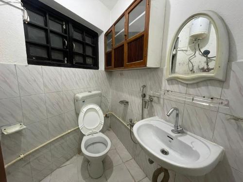 A bathroom at Dzambala Home