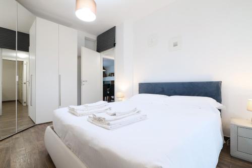 מיטה או מיטות בחדר ב-Mila Apartments Battista