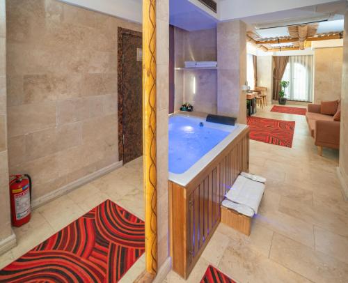 Cama o camas de una habitación en PASHA PALACE HOTEL