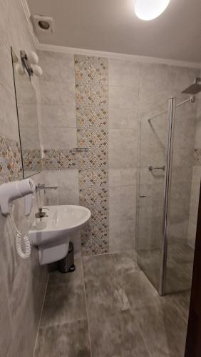 Ένα μπάνιο στο Hotel Pałacowa