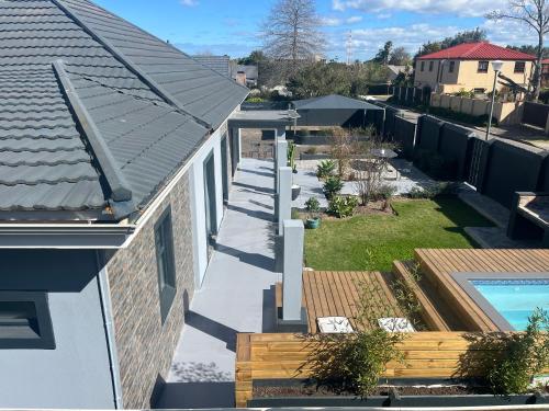 an aerial view of a house with a swimming pool at 28 on Symonds luxstudio 6 in George