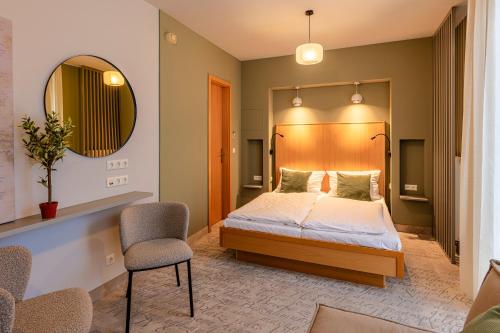 Voodi või voodid majutusasutuse Hotel Erbenhof toas