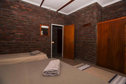 Ένα ή περισσότερα κρεβάτια σε δωμάτιο στο Leeurivier Veldhuis