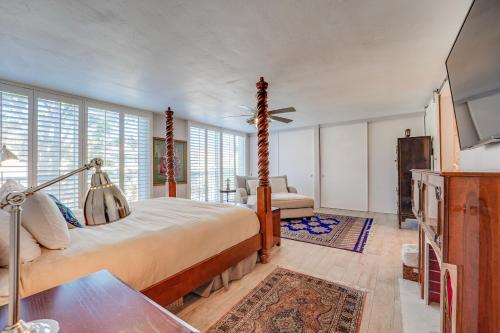 a bedroom with a bed and a tv in it at Bayfront Paradise - Flexible 30 Day plus w Amazing Bay View and Pool in San Diego